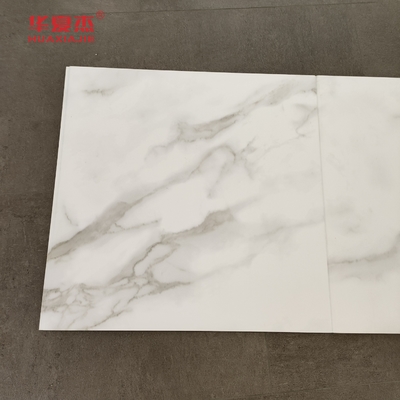 Painel de parede Wpc de mármore branco de alta qualidade 600x9mm Painel Wpc laminado à prova d'água fácil de limpar