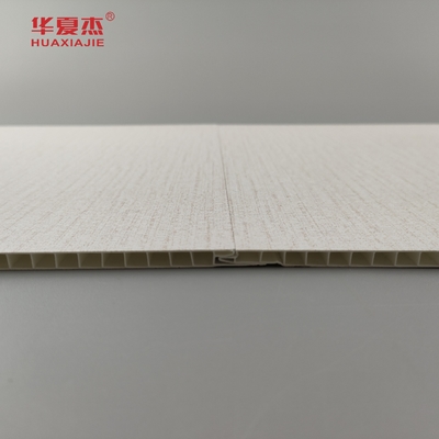 Vendas de fábrica de painéis de parede interiores de pvc estampado a quente grãos de madeira pvc tecto material de construção à prova de umidade