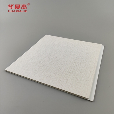 Vendas de fábrica de painéis de parede interiores de pvc estampado a quente grãos de madeira pvc tecto material de construção à prova de umidade