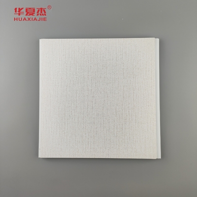 Vendas de fábrica de painéis de parede interiores de pvc estampado a quente grãos de madeira pvc tecto material de construção à prova de umidade