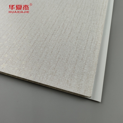 Vendas de fábrica de painéis de parede interiores de pvc estampado a quente grãos de madeira pvc tecto material de construção à prova de umidade