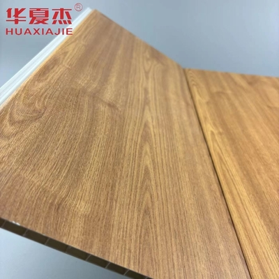 Venda a retalho Natureza Cor de madeira Parede impermeável Painéis de PVC Material de decoração de edifícios